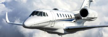 Citation X blanc en vol