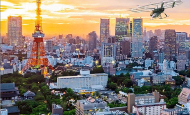 Vue aérienne AEROAFFAIRES Volocopter, coucher du soleil urbain.